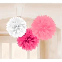 Pompones de papel blanco, rosa y fucsia